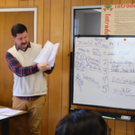 Chase teaching his ELL class. Guadalupe Centers